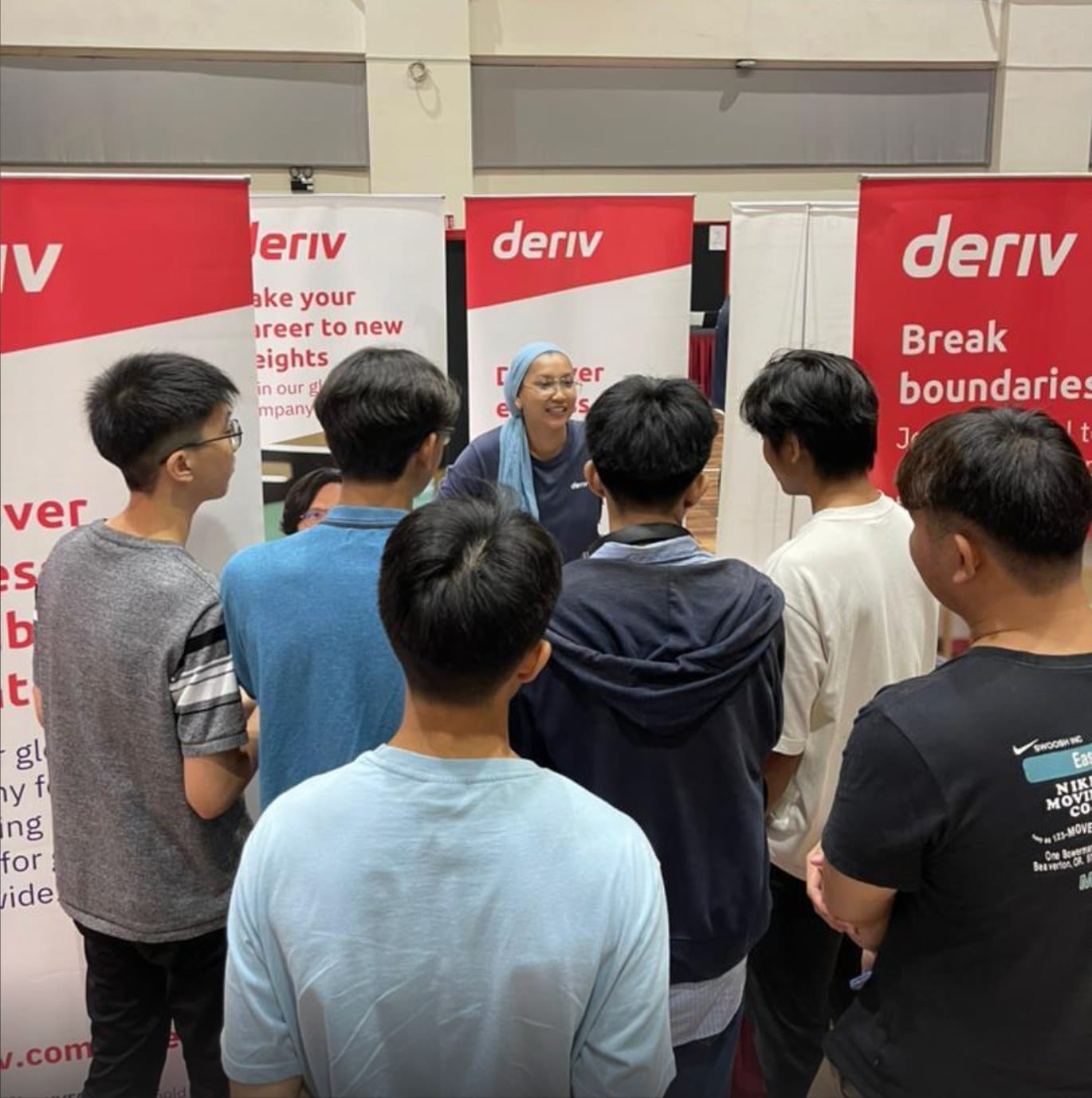 Deriv HR representative meeting with students at the Taylor’s NexTech Conference.