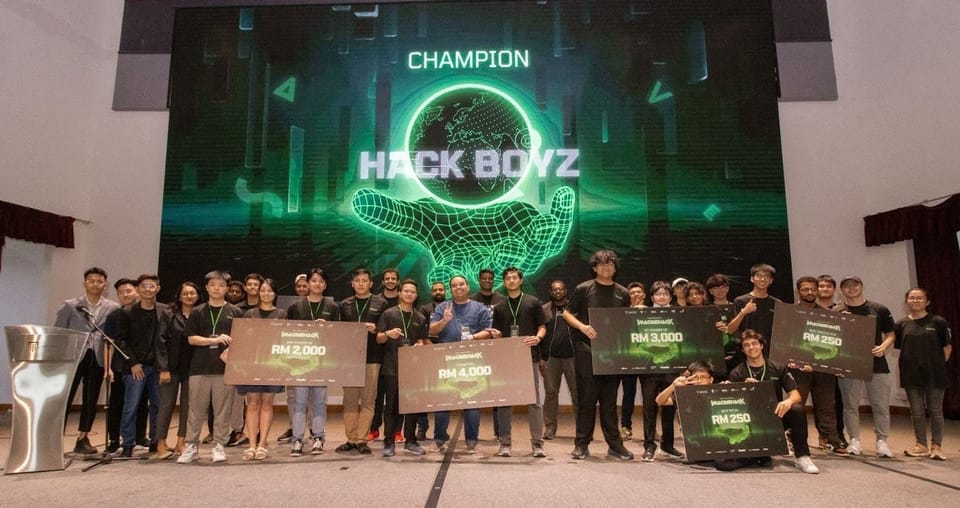The champion group, Hack Boyz, celebrating together with their awards